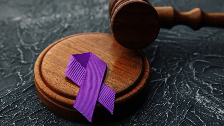 Purple ribbon representing domestic violence.